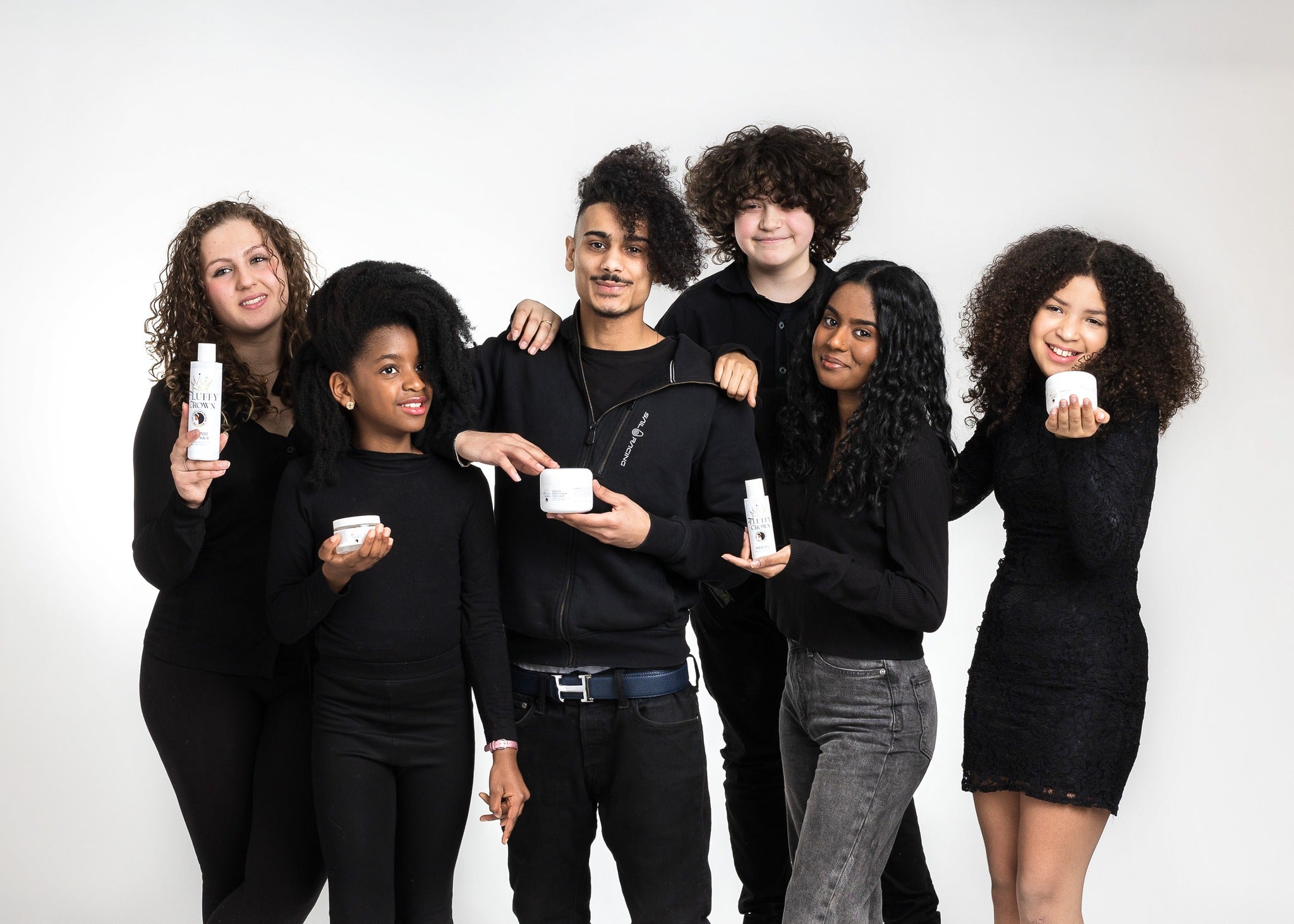 Six people with curly hair showing their nice curly hair and showing Fluffy Crown products for curly hair